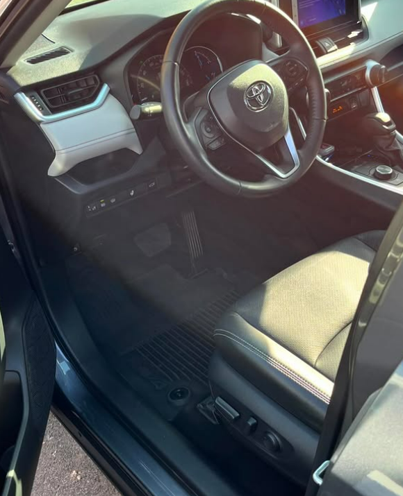 Toyota RAV4 interior with clean light upholstery